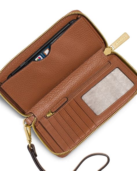 michael kors phone wallet|michael kors multifunction wallet.